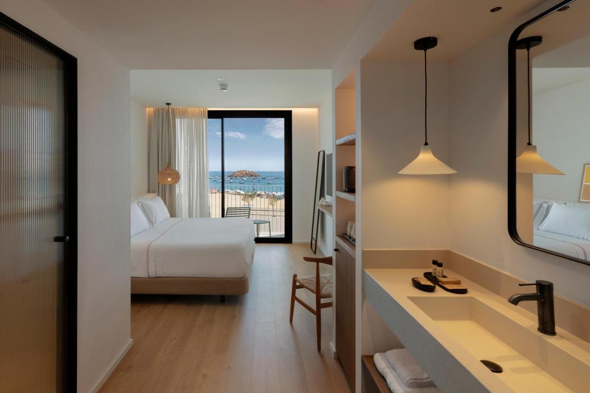 Cama o camas de una habitación en Elisabeth by the Sea Hotel