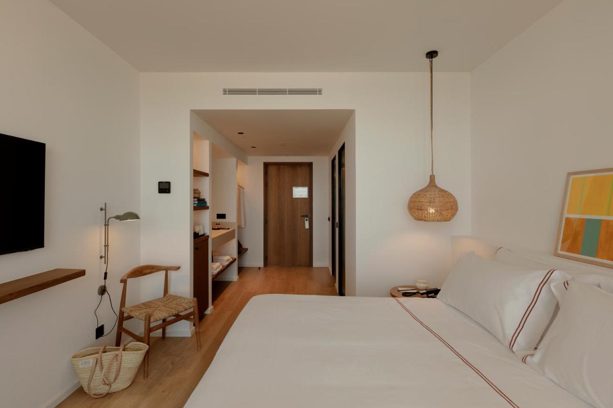Cama o camas de una habitación en Elisabeth by the Sea Hotel