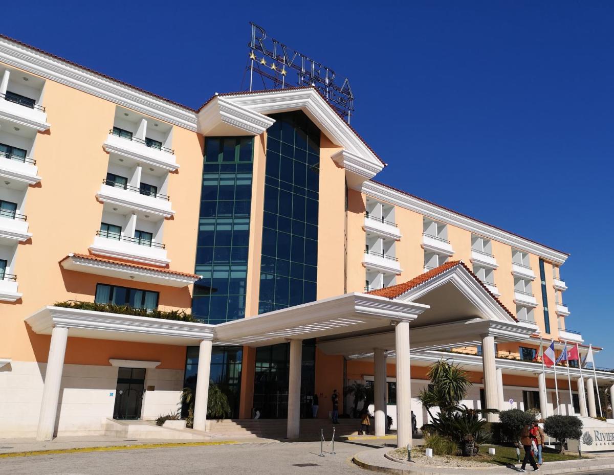 uma representação da fachada de um hotel em Riviera Hotel em Carcavelos