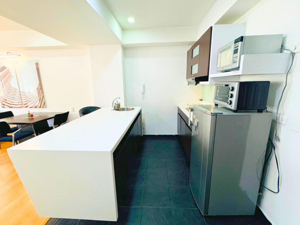Hotel Aparta Suite Continental Bogotá - Housity