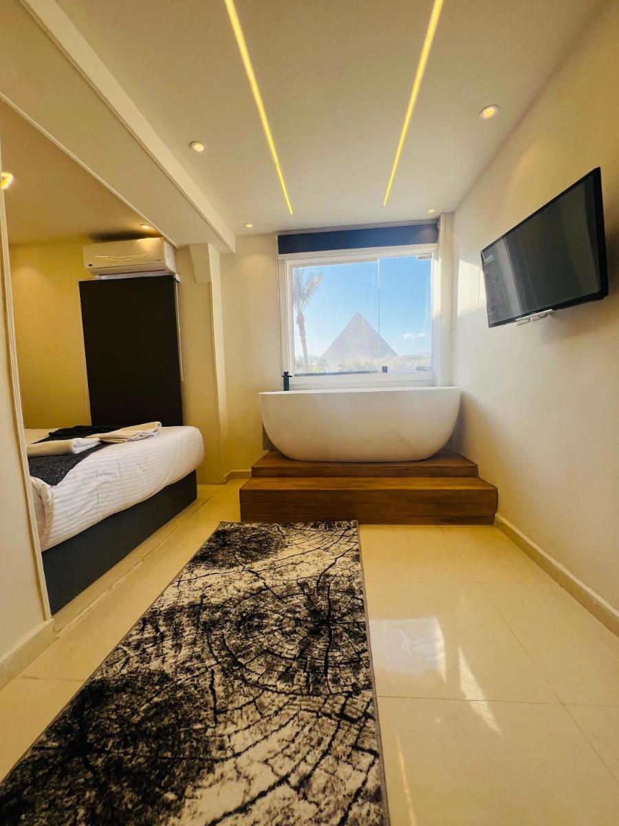 Golden Scarab Pyramids Hotel - Housity