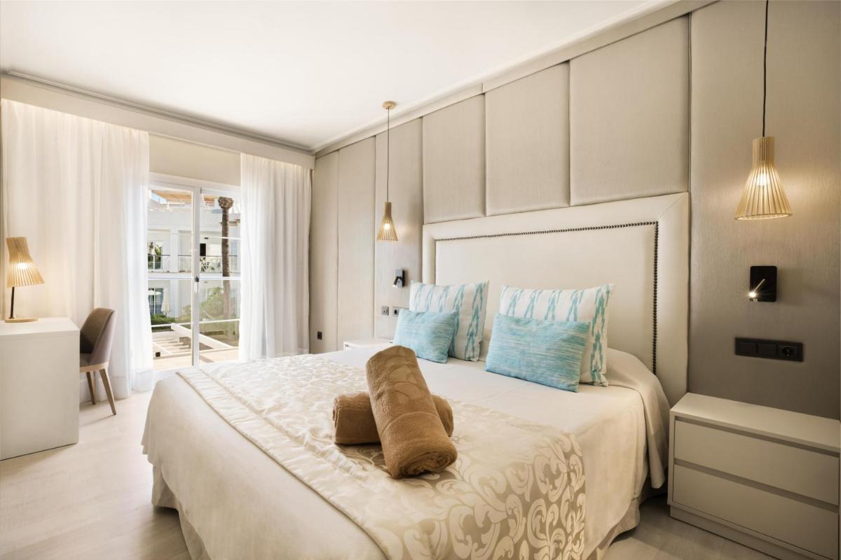 Cama o camas de una habitación en VIVA Cala Mesquida Resort & Spa