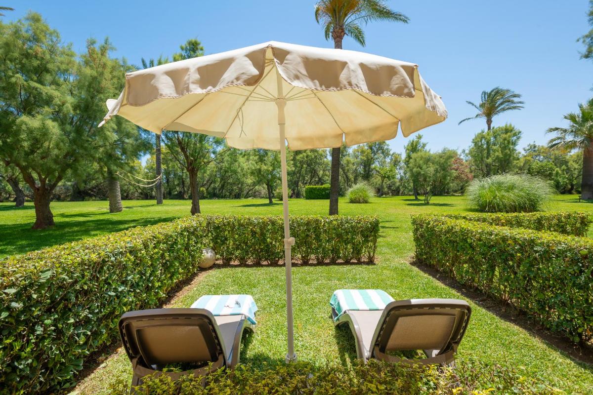 Jardín al aire libre en Club del Sol Aparthotel