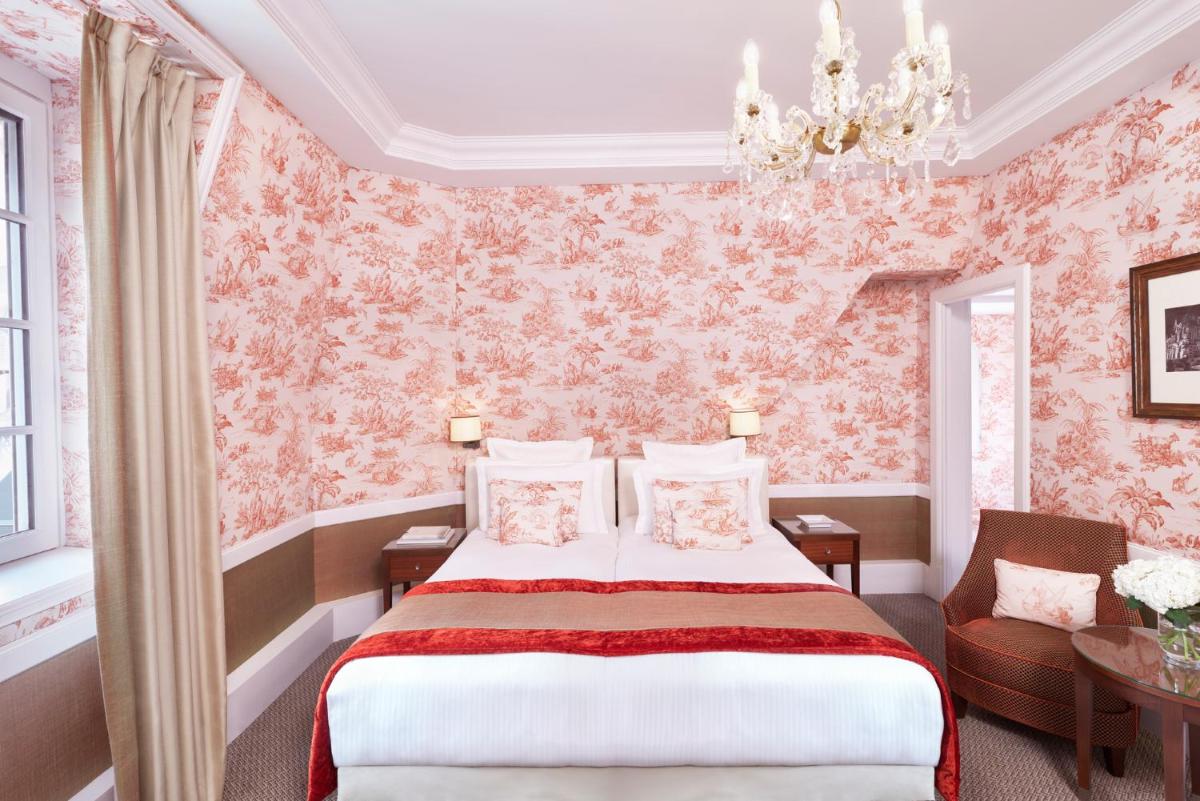 Un ou plusieurs lits dans un hébergement de l'établissement Hôtel Barrière Le Normandy