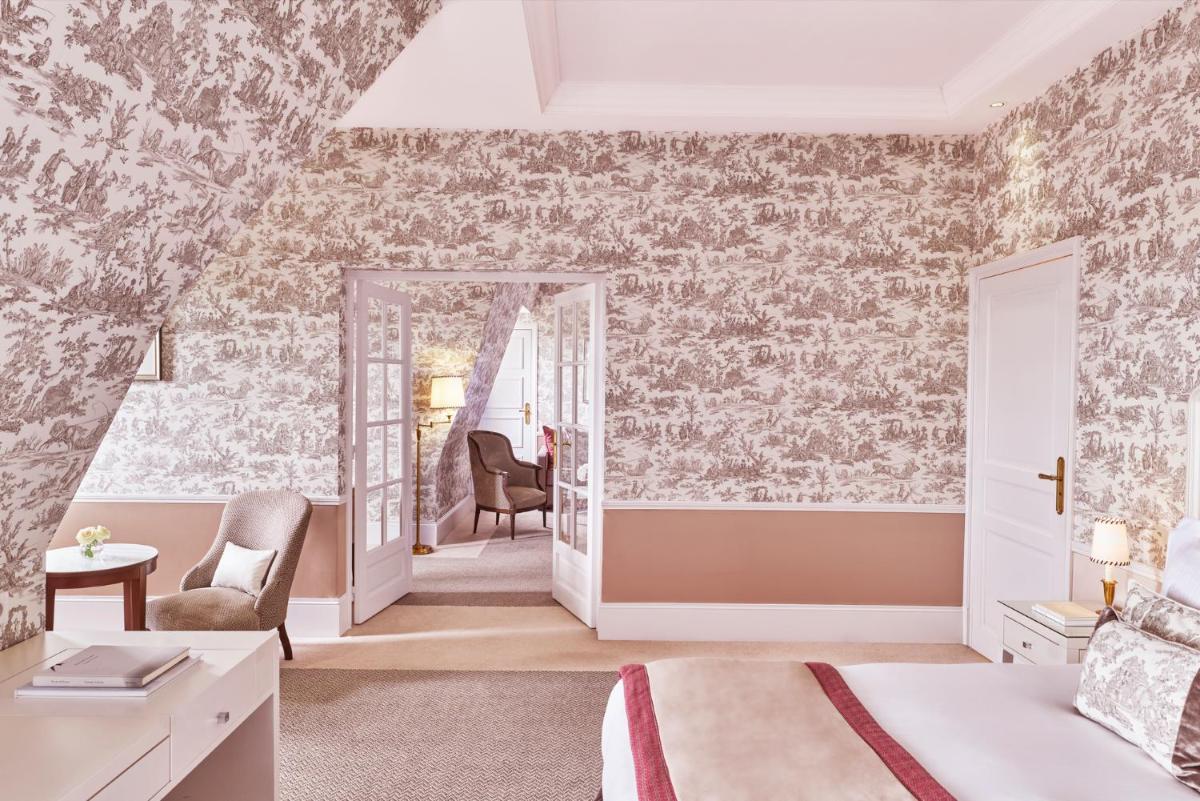 Un ou plusieurs lits dans un hébergement de l'établissement Hôtel Barrière Le Normandy