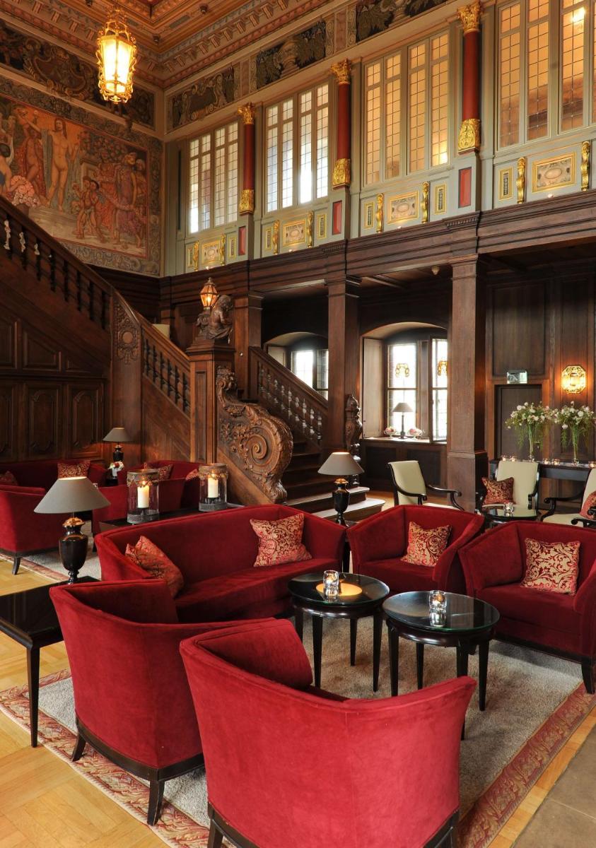 Ein Sitzbereich in der Unterkunft Schlosshotel Münchhausen