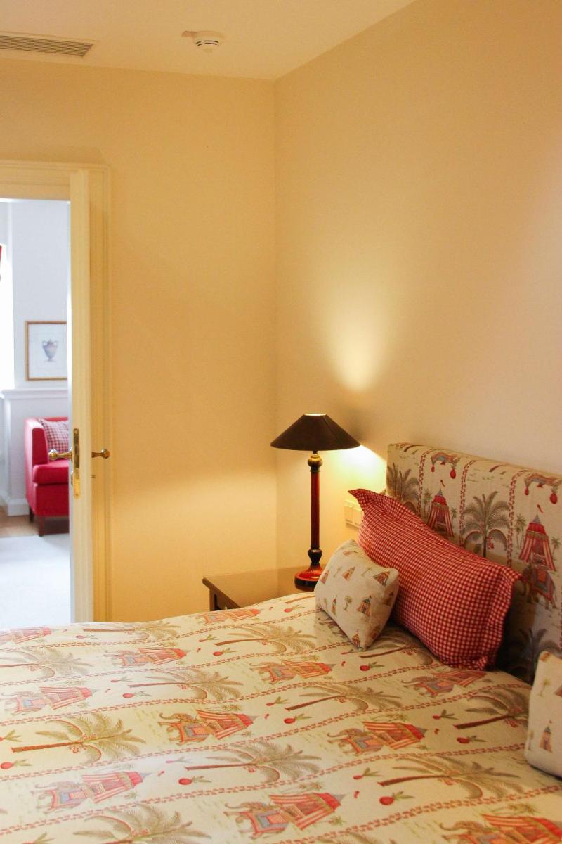 Ein Bett oder Betten in einem Zimmer der Unterkunft Schlosshotel Münchhausen