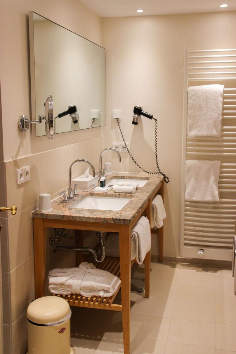 Ein Badezimmer in der Unterkunft Schlosshotel Münchhausen