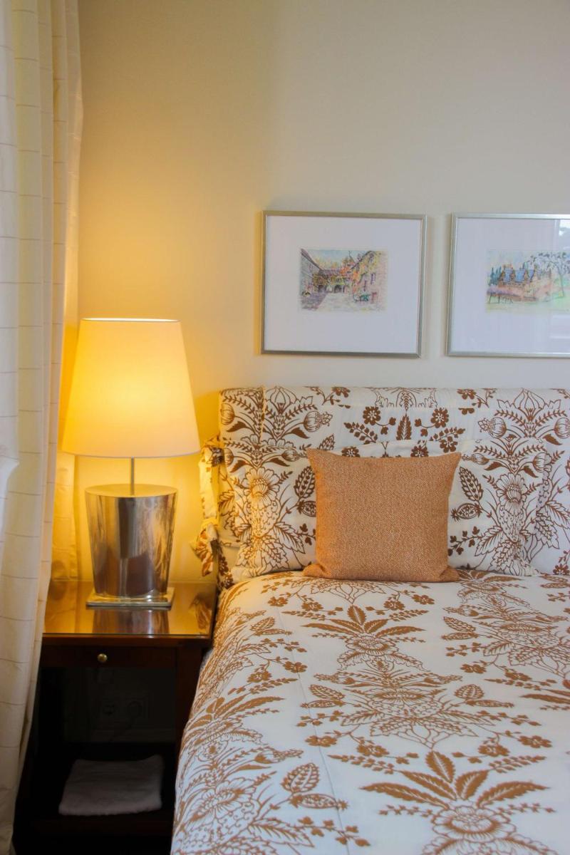 Ein Bett oder Betten in einem Zimmer der Unterkunft Schlosshotel Münchhausen