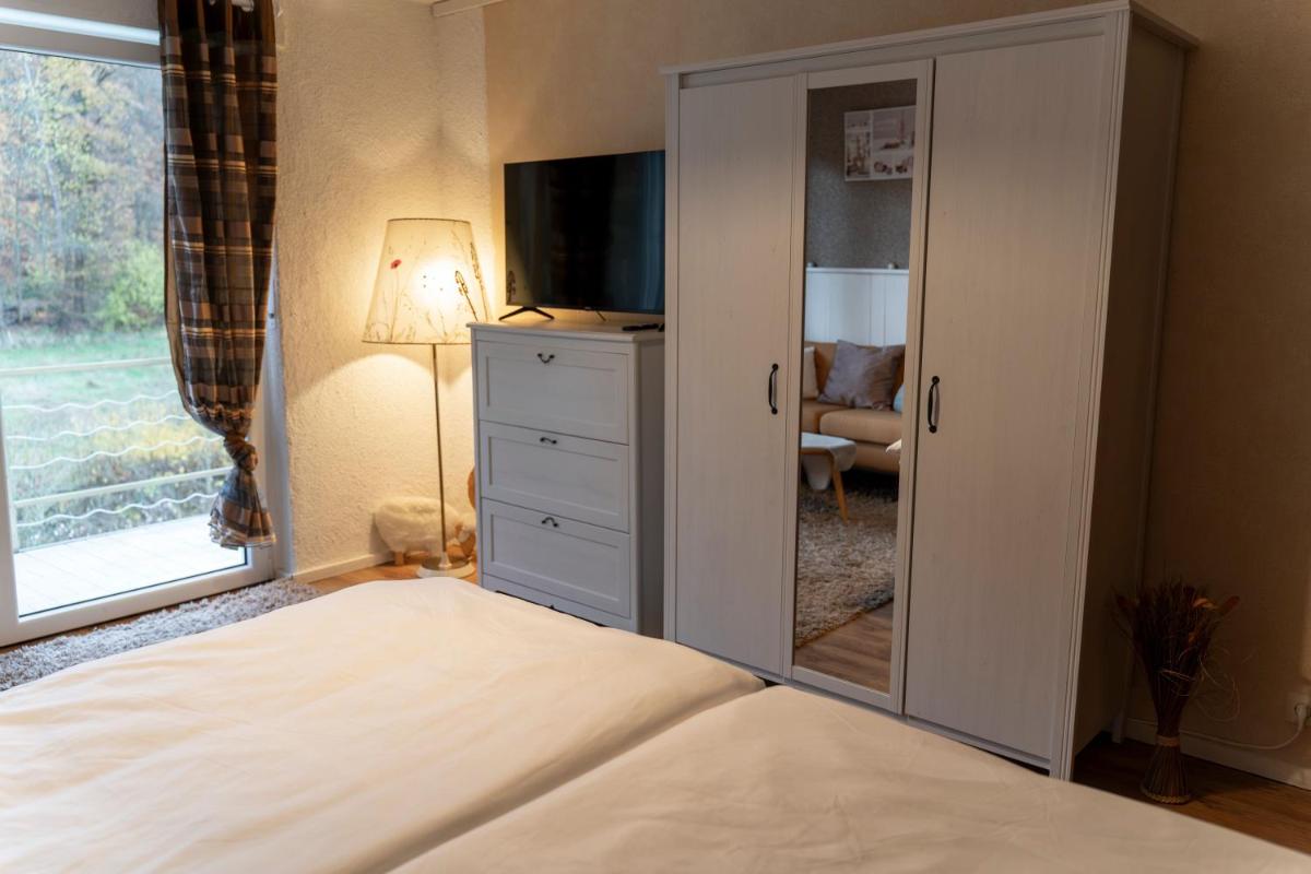 Marburg Apartment pfiffige Luisa in ruhiger Waldrandlage mit Balkon und Wintergarten - Housity