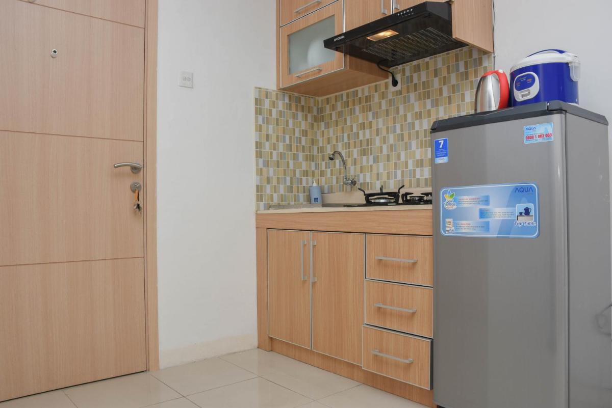 Cozy and Strategic Studio at Bassura City Apartment By Travelio - Housity