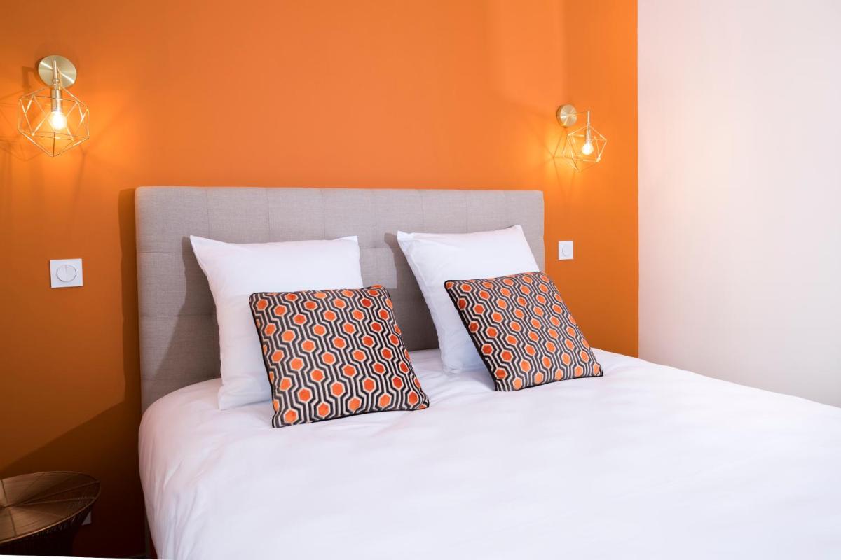 Un ou plusieurs lits dans un hébergement de l'établissement Hotel Clos Castel Villas Spa