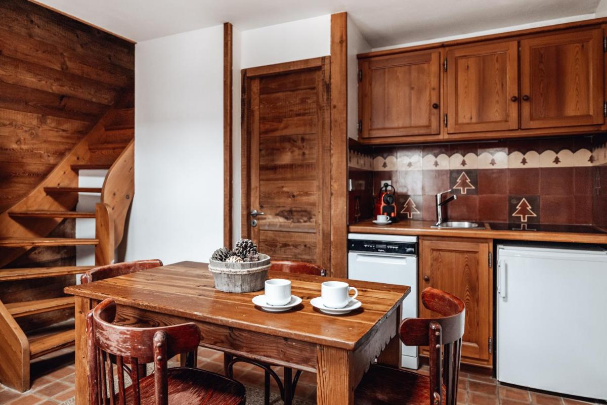 Cuisine ou kitchenette dans l'établissement Alliey & Spa Piscine Appart-hôtel Serre chevalier