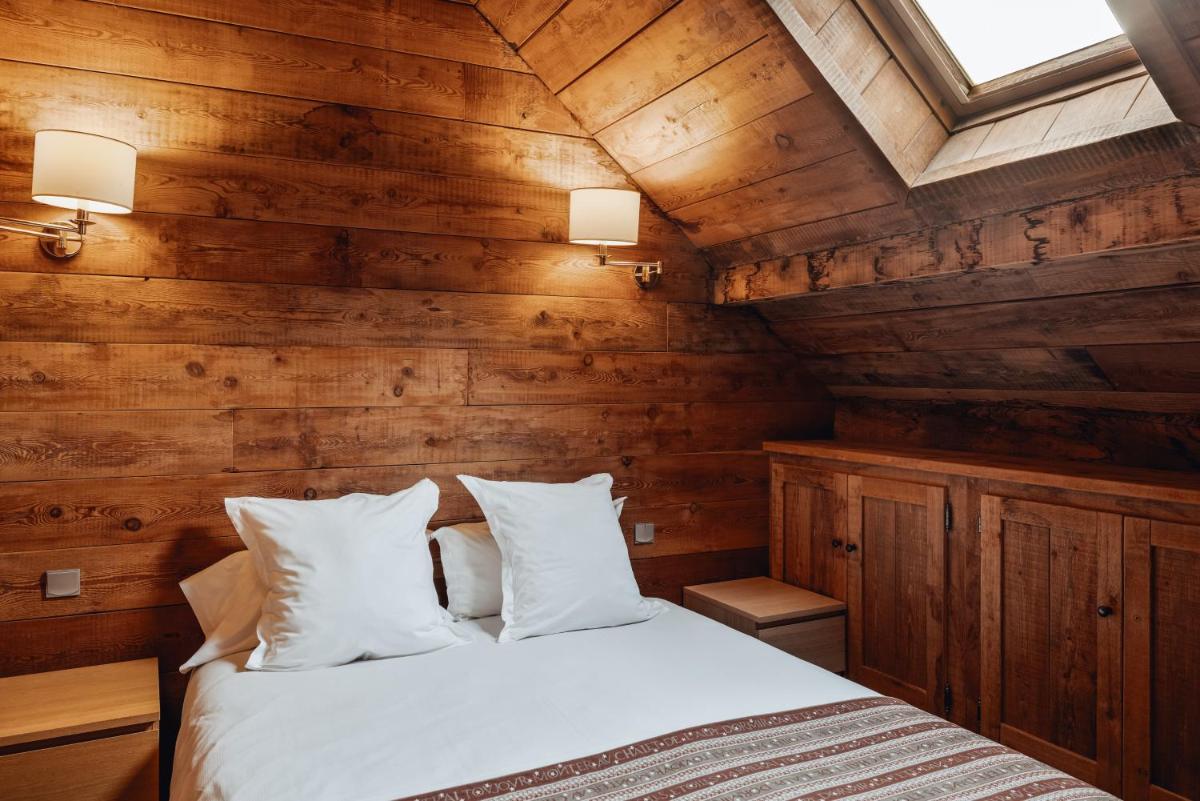 Un ou plusieurs lits dans un hébergement de l'établissement Alliey & Spa Piscine Appart-hôtel Serre chevalier