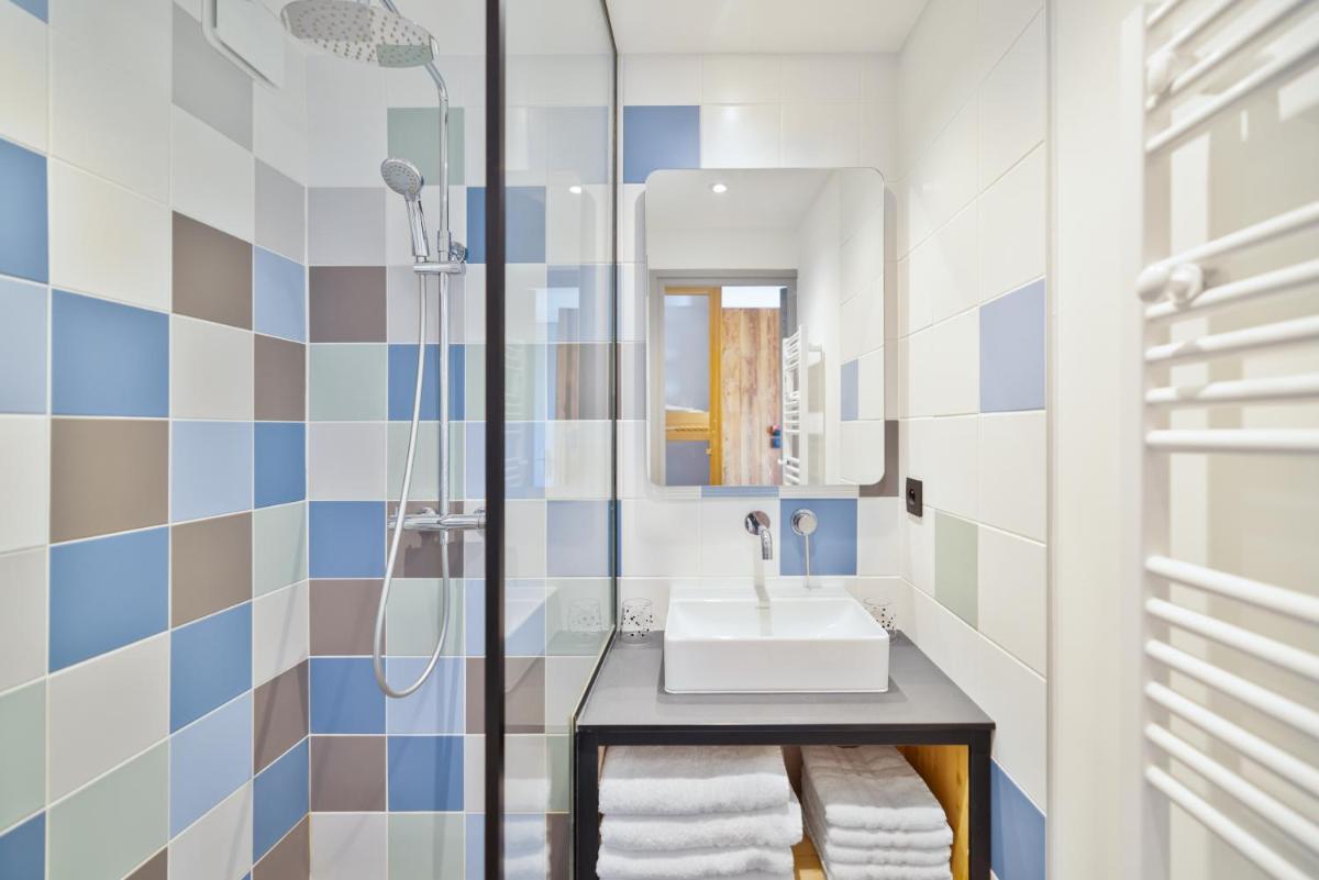 Salle de bains dans l'établissement Alliey & Spa Piscine Appart-hôtel Serre chevalier