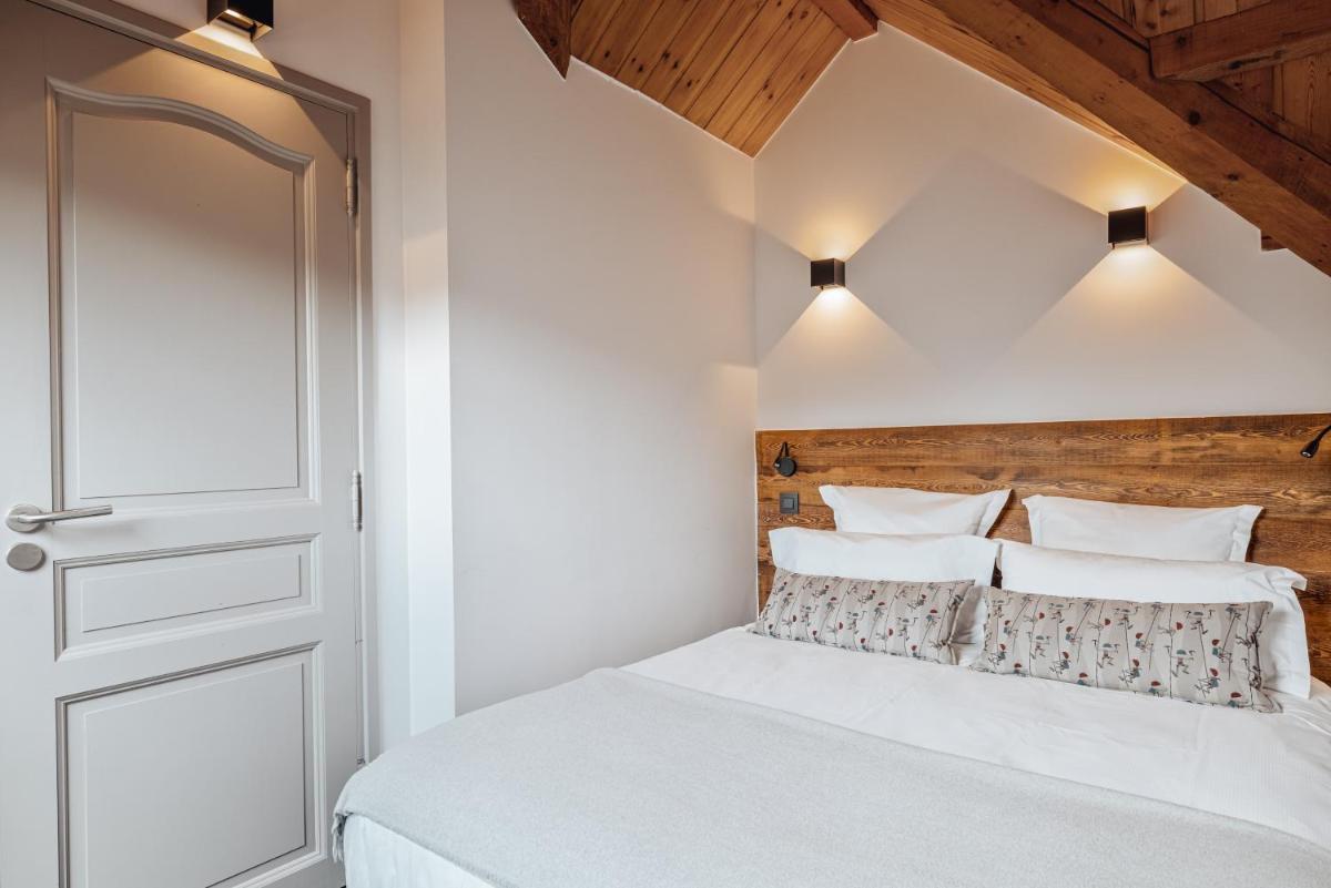 Un ou plusieurs lits dans un hébergement de l'établissement Alliey & Spa Piscine Appart-hôtel Serre chevalier