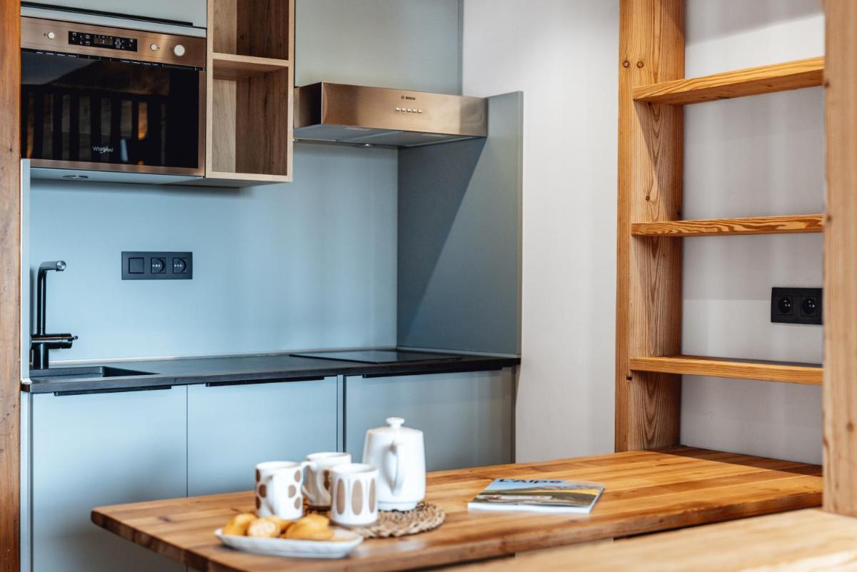 Cuisine ou kitchenette dans l'établissement Alliey & Spa Piscine Appart-hôtel Serre chevalier