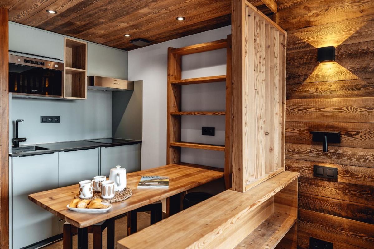 Cuisine ou kitchenette dans l'établissement Alliey & Spa Piscine Appart-hôtel Serre chevalier