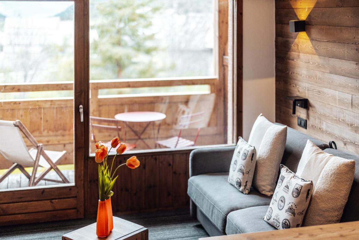 Coin salon dans l'établissement Alliey & Spa Piscine Appart-hôtel Serre chevalier