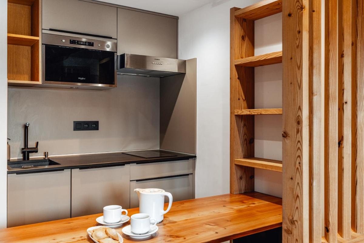 Cuisine ou kitchenette dans l'établissement Alliey & Spa Piscine Appart-hôtel Serre chevalier