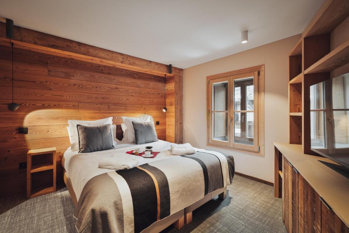 Un ou plusieurs lits dans un hébergement de l'établissement Alliey & Spa Piscine Appart-hôtel Serre chevalier