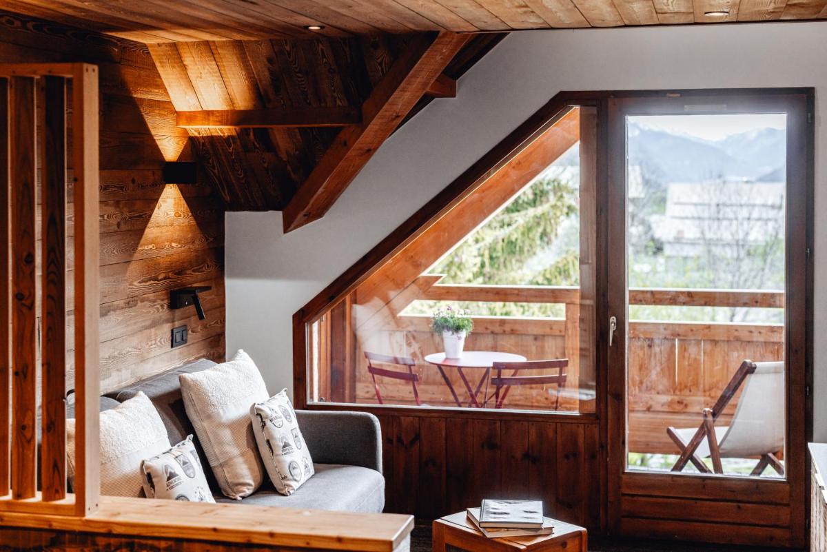 Coin salon dans l'établissement Alliey & Spa Piscine Appart-hôtel Serre chevalier
