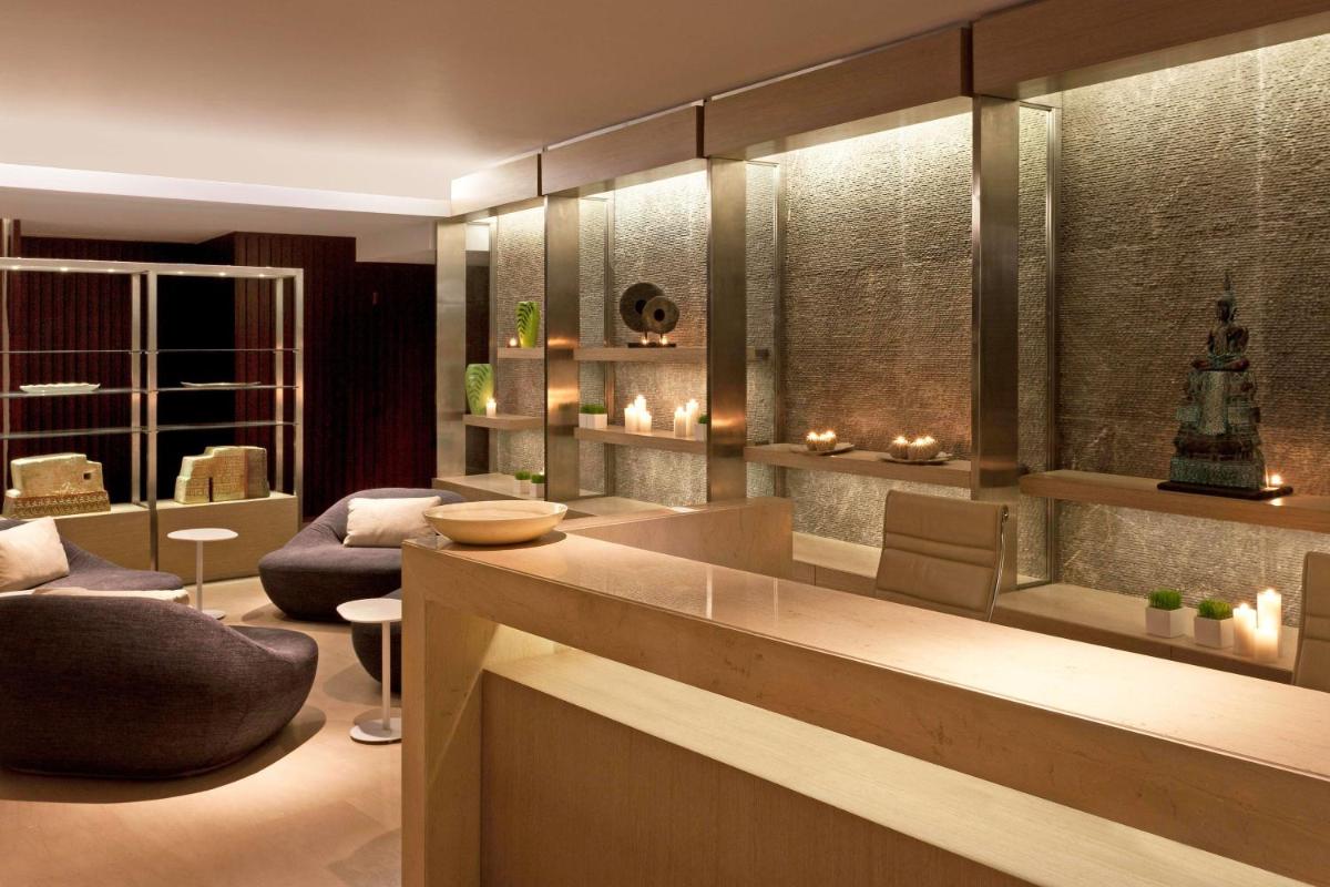 a living room with a couch and a table at The Westin Gurgaon, New Delhi in Gurgaon