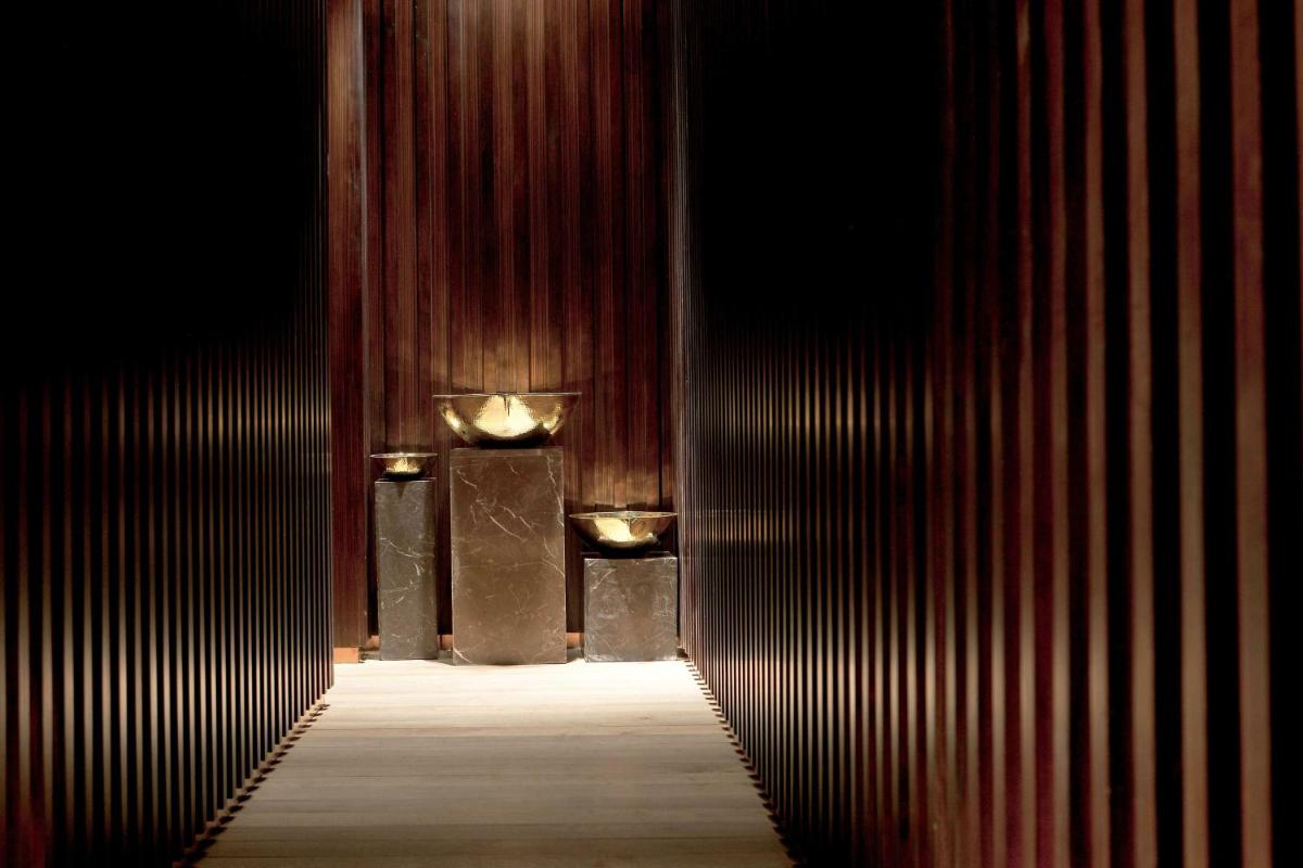 an empty hallway with lights in a dark room at The Westin Gurgaon, New Delhi in Gurgaon