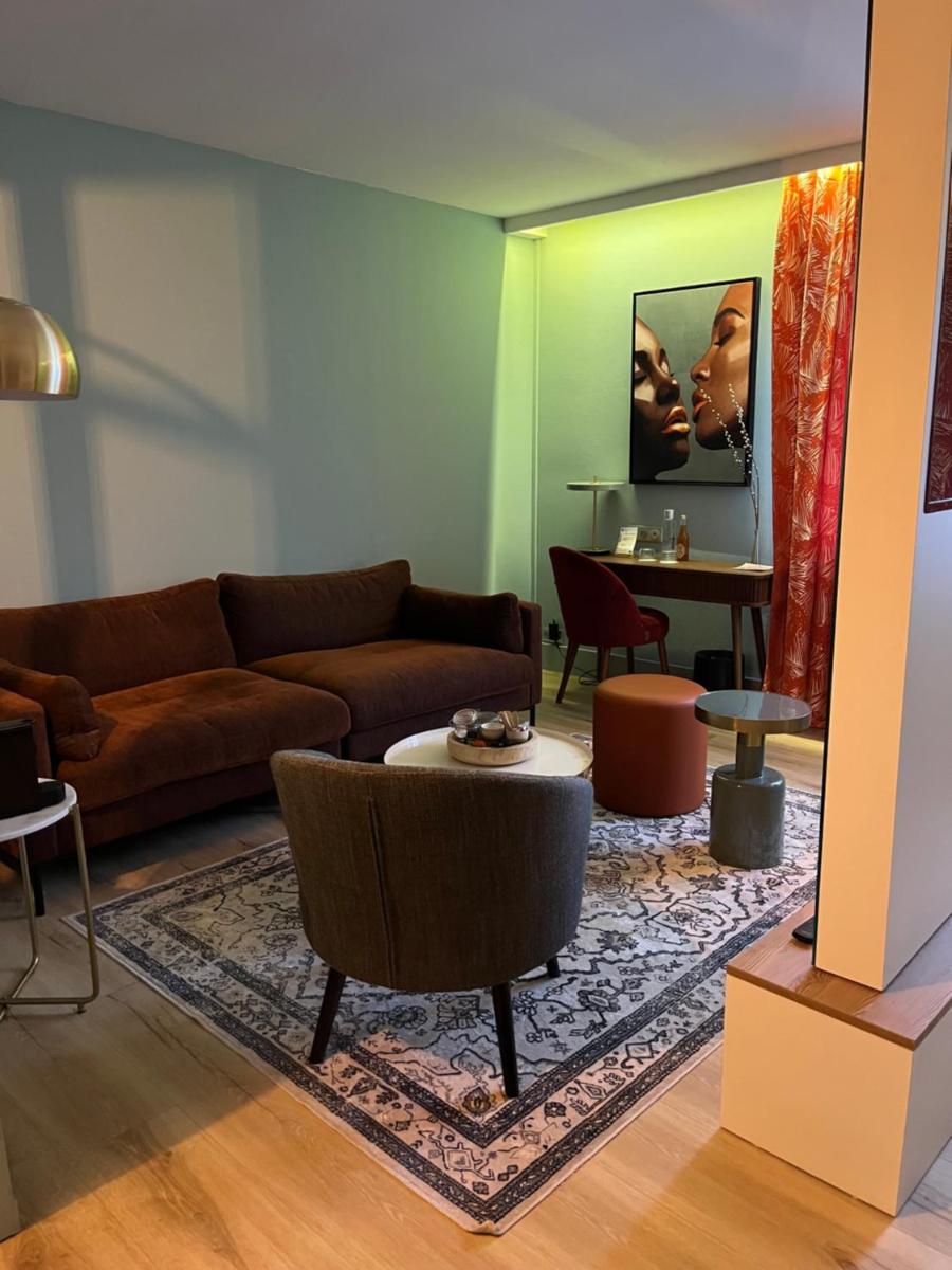 Coin salon dans l'établissement Hotel Normandy
