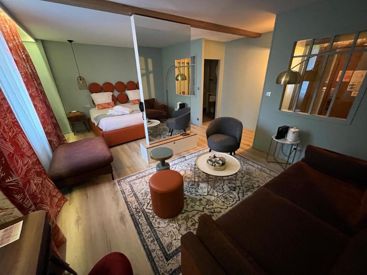 Un ou plusieurs lits dans un hébergement de l'établissement Hotel Normandy