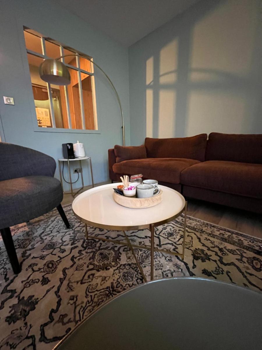 Coin salon dans l'établissement Hotel Normandy