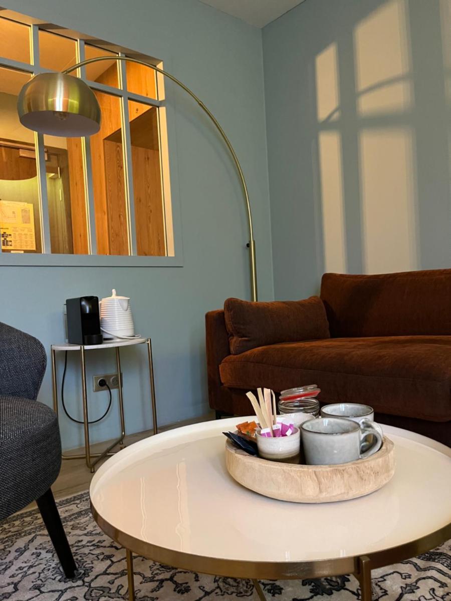 Coin salon dans l'établissement Hotel Normandy