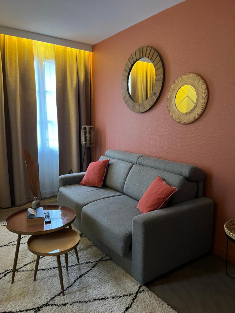 Coin salon dans l'établissement Hotel Normandy