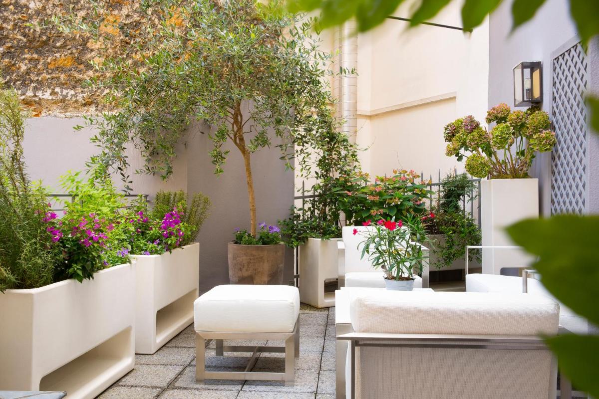 Coin salon dans l'établissement Hôtel Baume