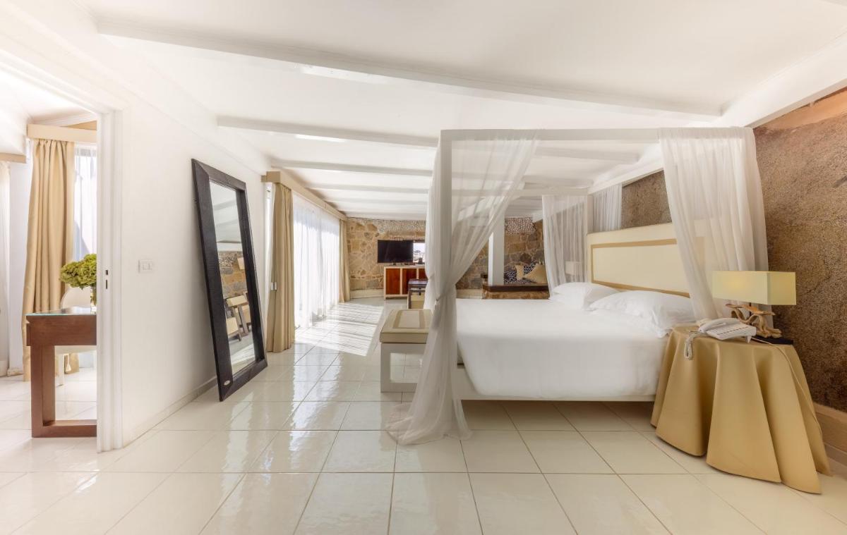 Un ou plusieurs lits dans un hébergement de l'établissement Hotel & SPA des Pecheurs