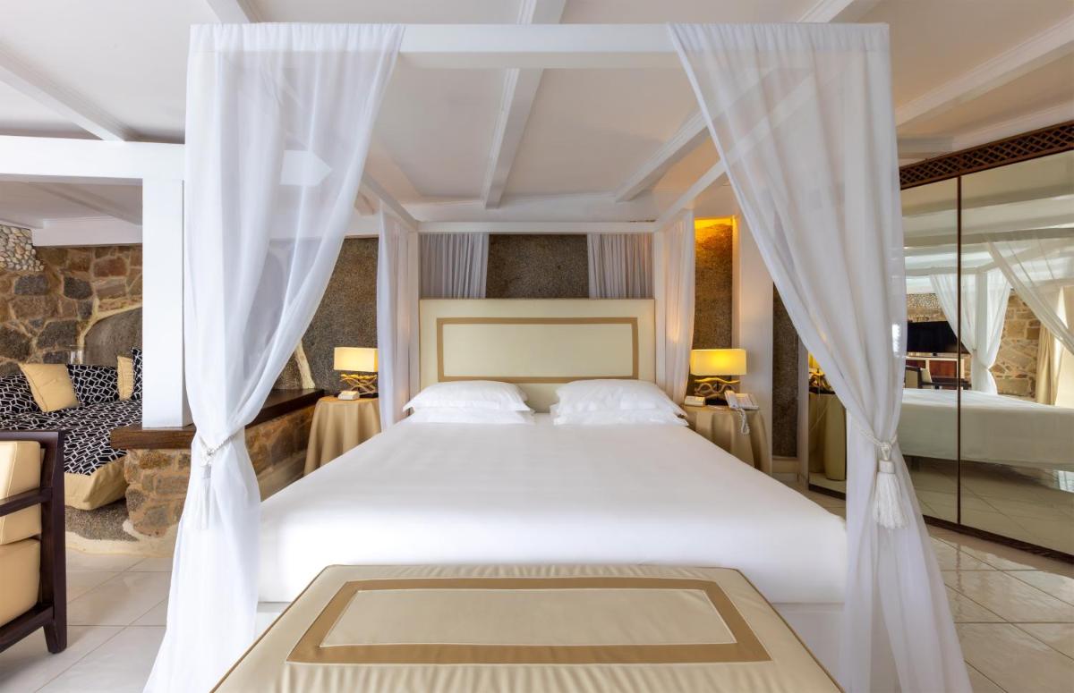 Un ou plusieurs lits dans un hébergement de l'établissement Hotel & SPA des Pecheurs