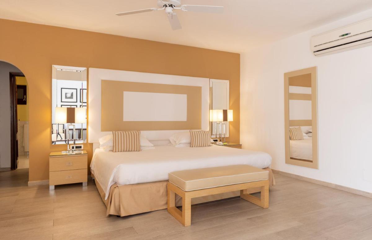 Un ou plusieurs lits dans un hébergement de l'établissement Hotel & SPA des Pecheurs