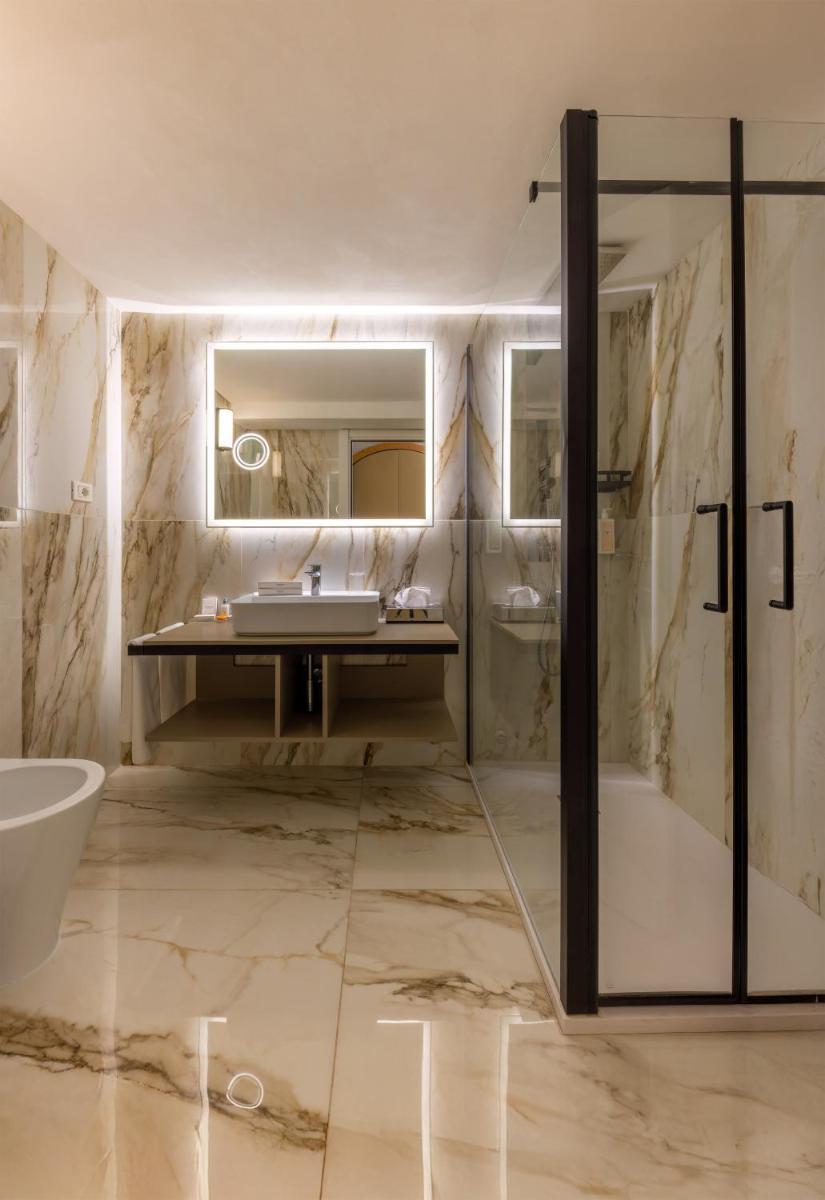Salle de bains dans l'établissement Hotel & SPA des Pecheurs