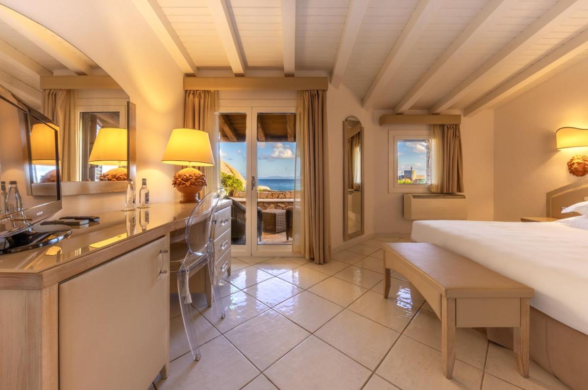 Un ou plusieurs lits dans un hébergement de l'établissement Hotel & SPA des Pecheurs