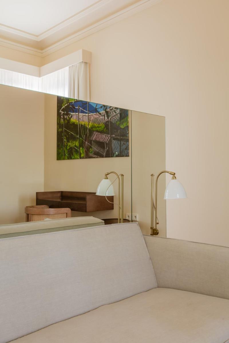 Uma cama ou camas num quarto em Palacete Severo