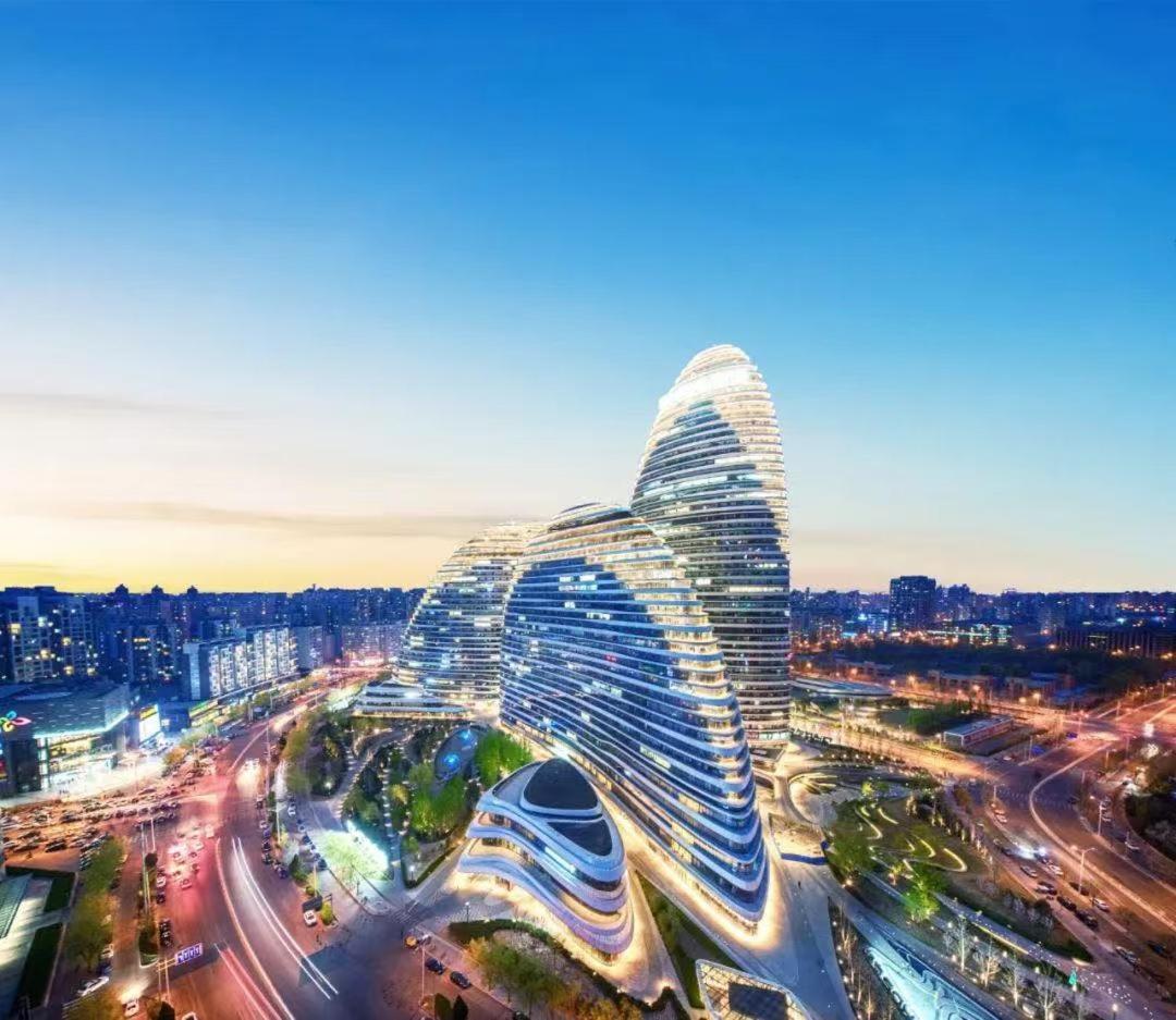 Happy Dragon Saga Hotel whole-house heating Free wifi unlimited for westen software and fluent English speaking,Tourist ticket service&food recommendation,Near Tian'AnMen Forbidden City,Wangfujing walking street,Easy to get any tour sights by metro - Housity