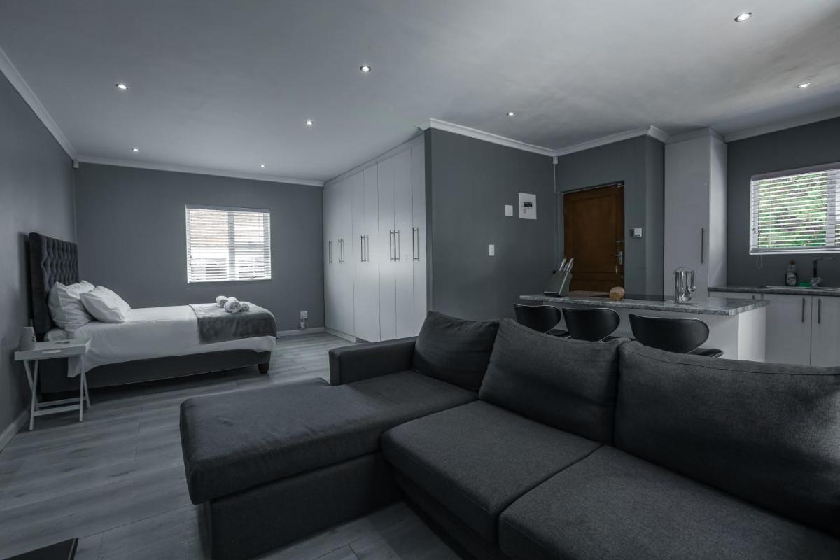 Milo's Sky Grey Guest House - No Load shedding - Housity