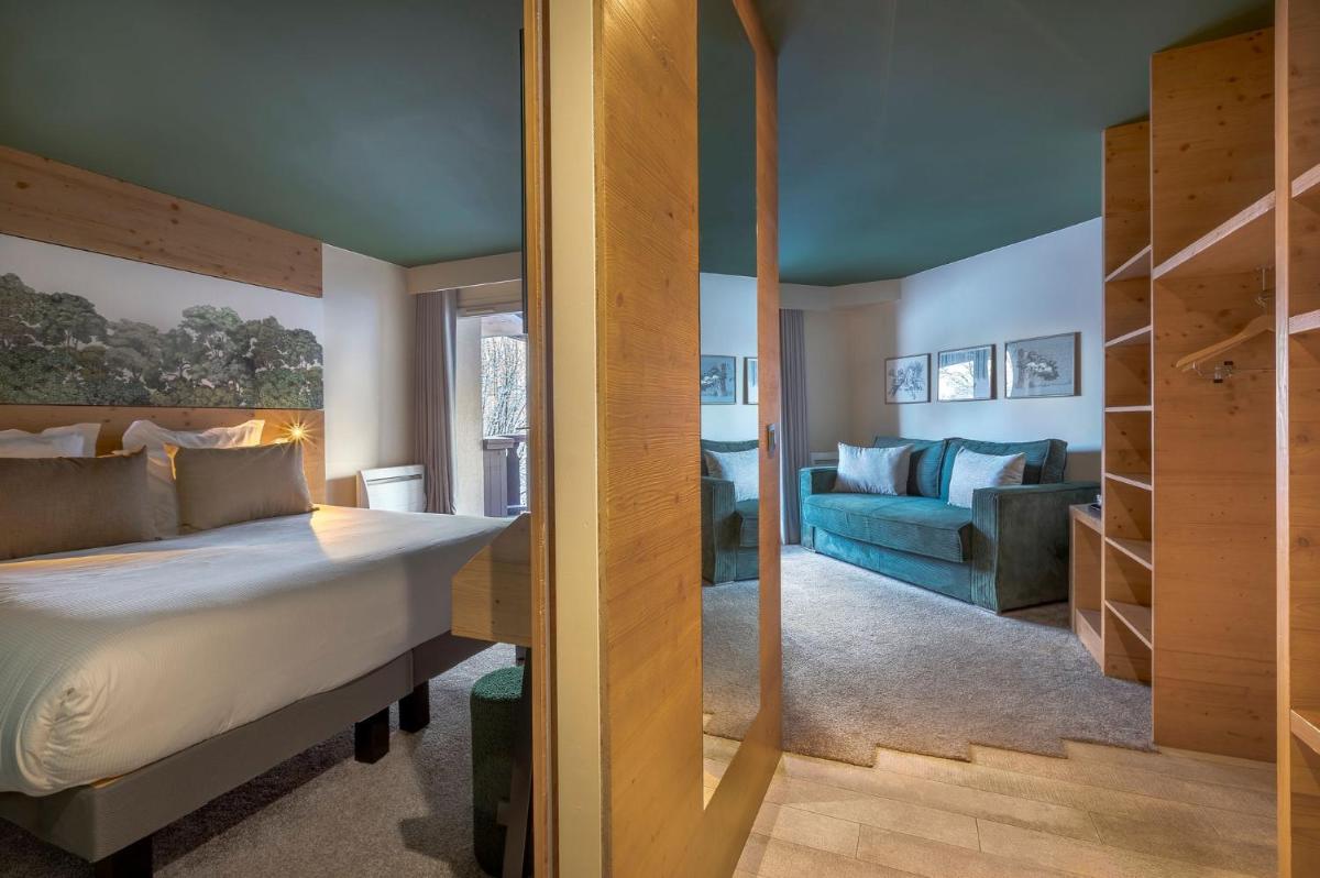 Un ou plusieurs lits dans un hébergement de l'établissement Lykke Hôtel & Spa Chamonix - ex Mercure