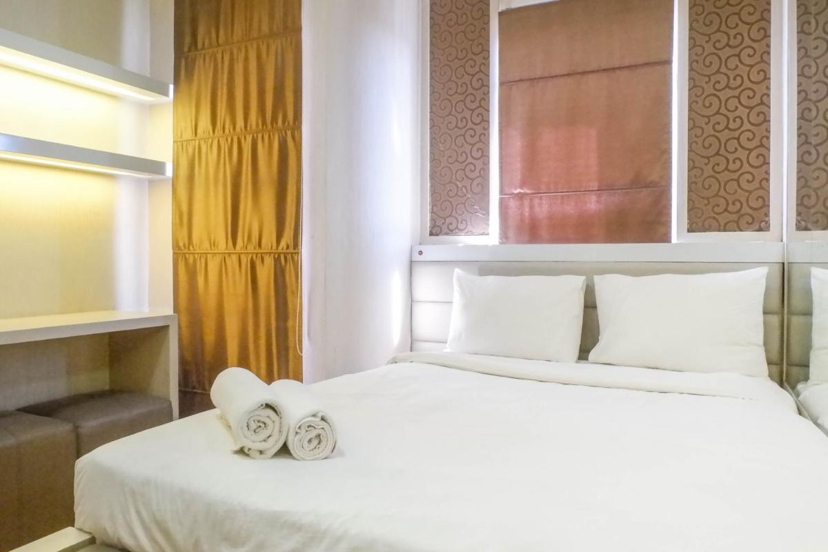 Trendy and Tidy Studio Room at Puri Mas Apartment By Travelio - Housity