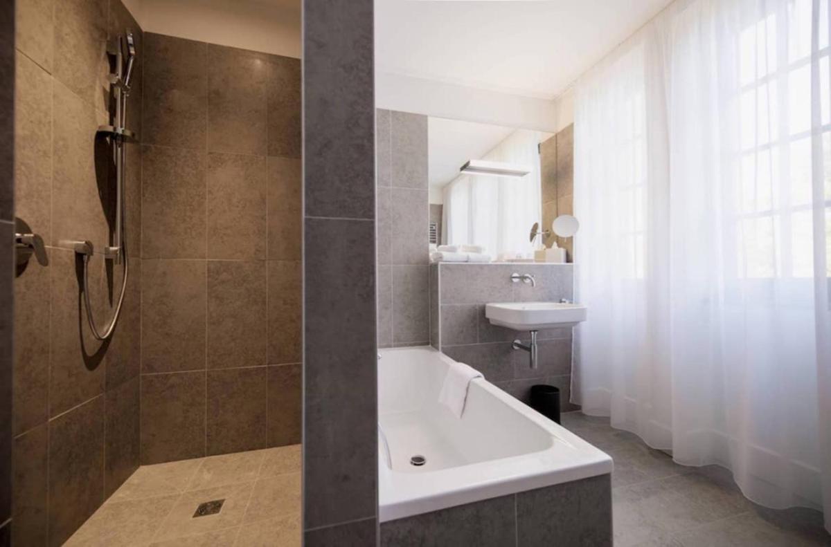 Salle de bains dans l'établissement Fourvière Hôtel