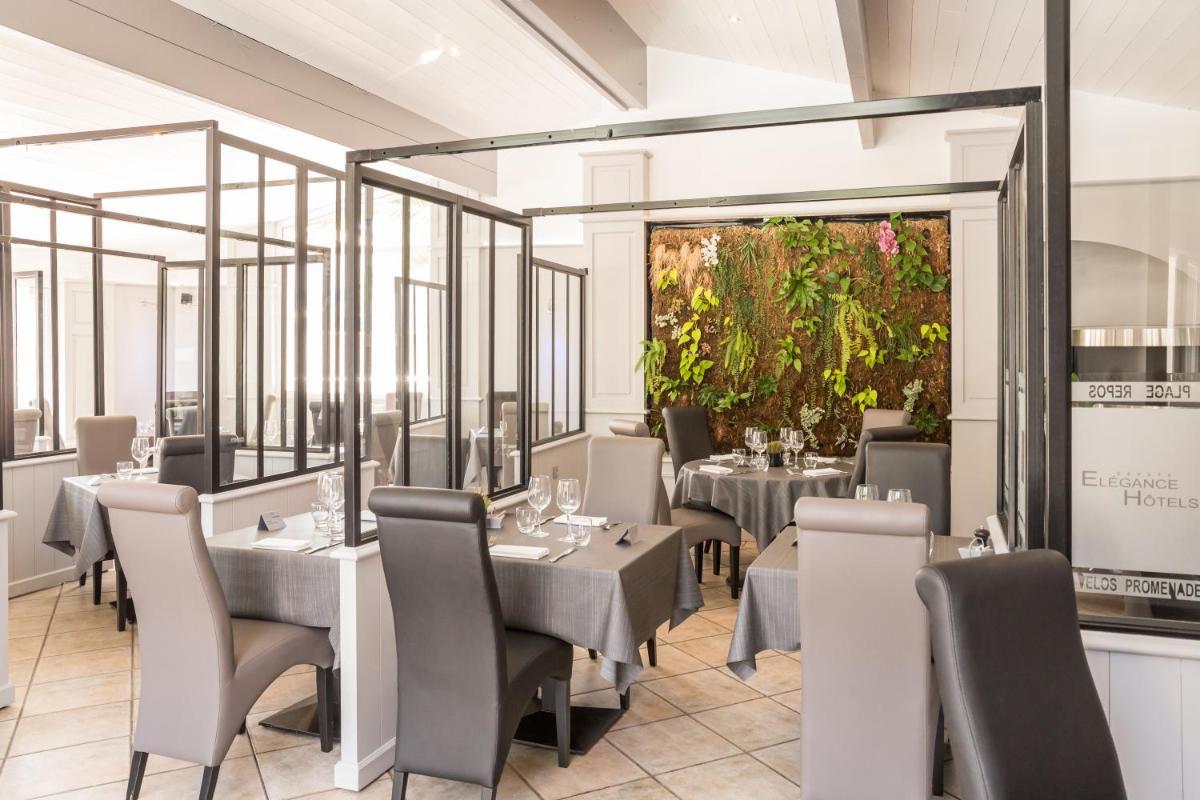 Restaurant ou autre lieu de restauration dans l'établissement Hôtel Restaurant & Spa Plaisir