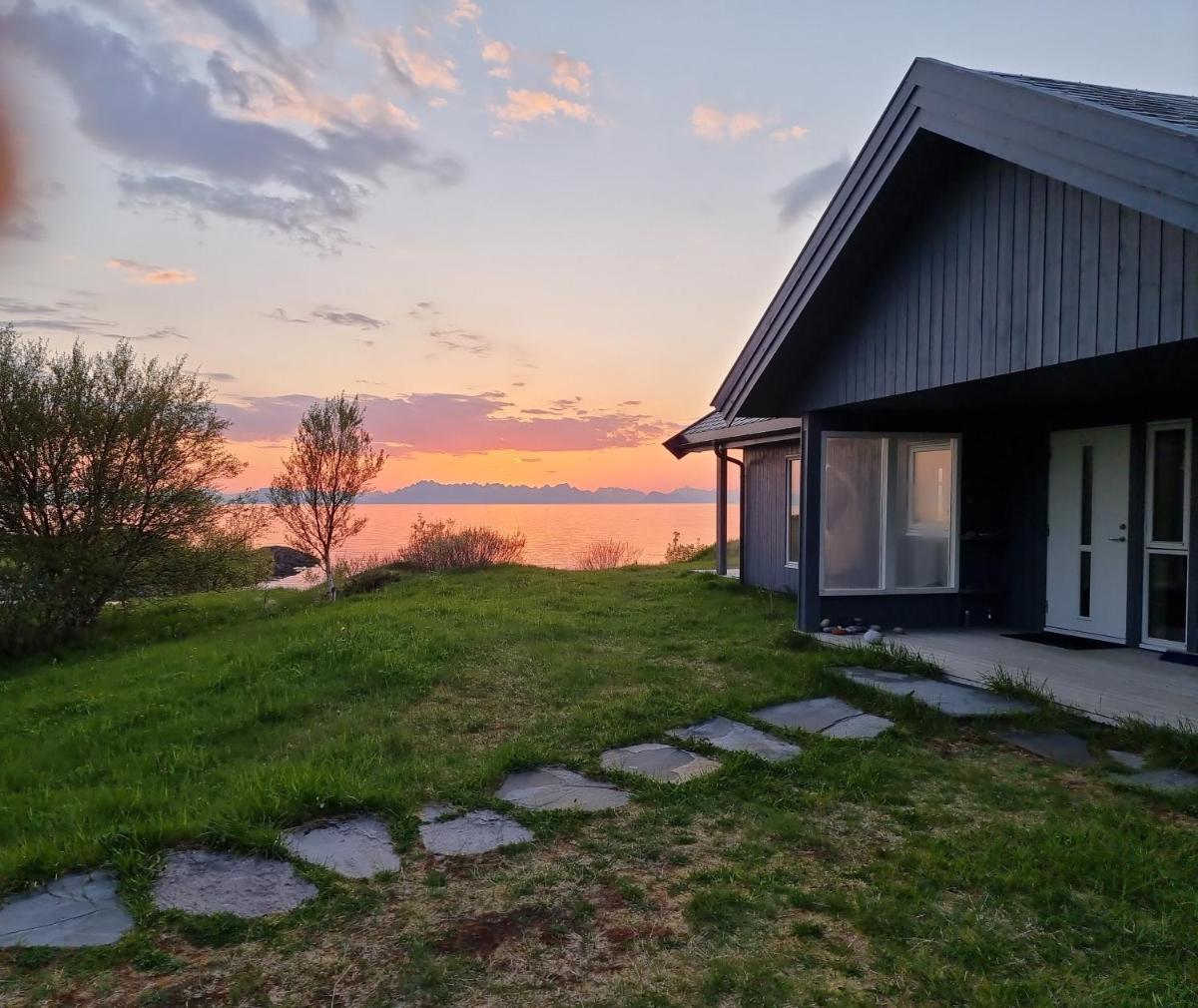 See Lofoten mountains midnight sun and nothern lights in Steigen - Housity