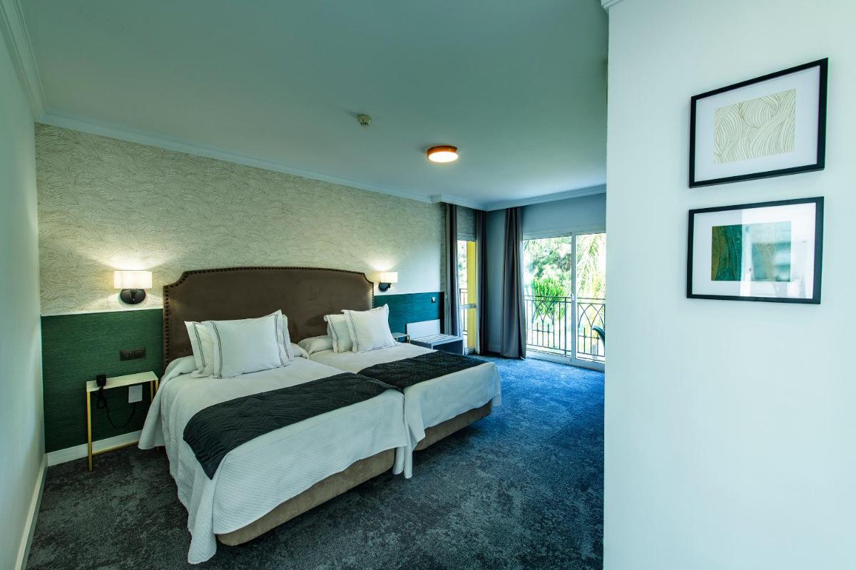 Cama o camas de una habitación en Hotel Tamisa Golf