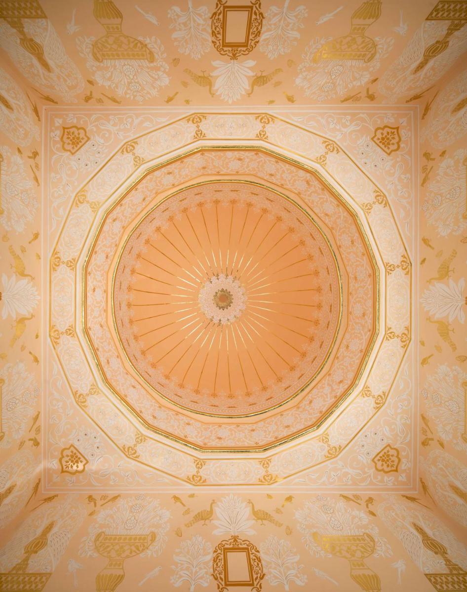 an ornate ceiling of a building with a dome at Hyatt Regency Jaipur Mansarovar in Jaipur an ornate ceiling of a building with a dome at Hyatt Regency Jaipur Mansarovar in Jaipur