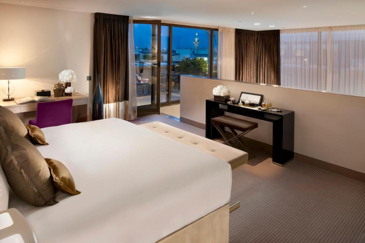 Un ou plusieurs lits dans un hébergement de l'établissement Mandarin Oriental, Paris